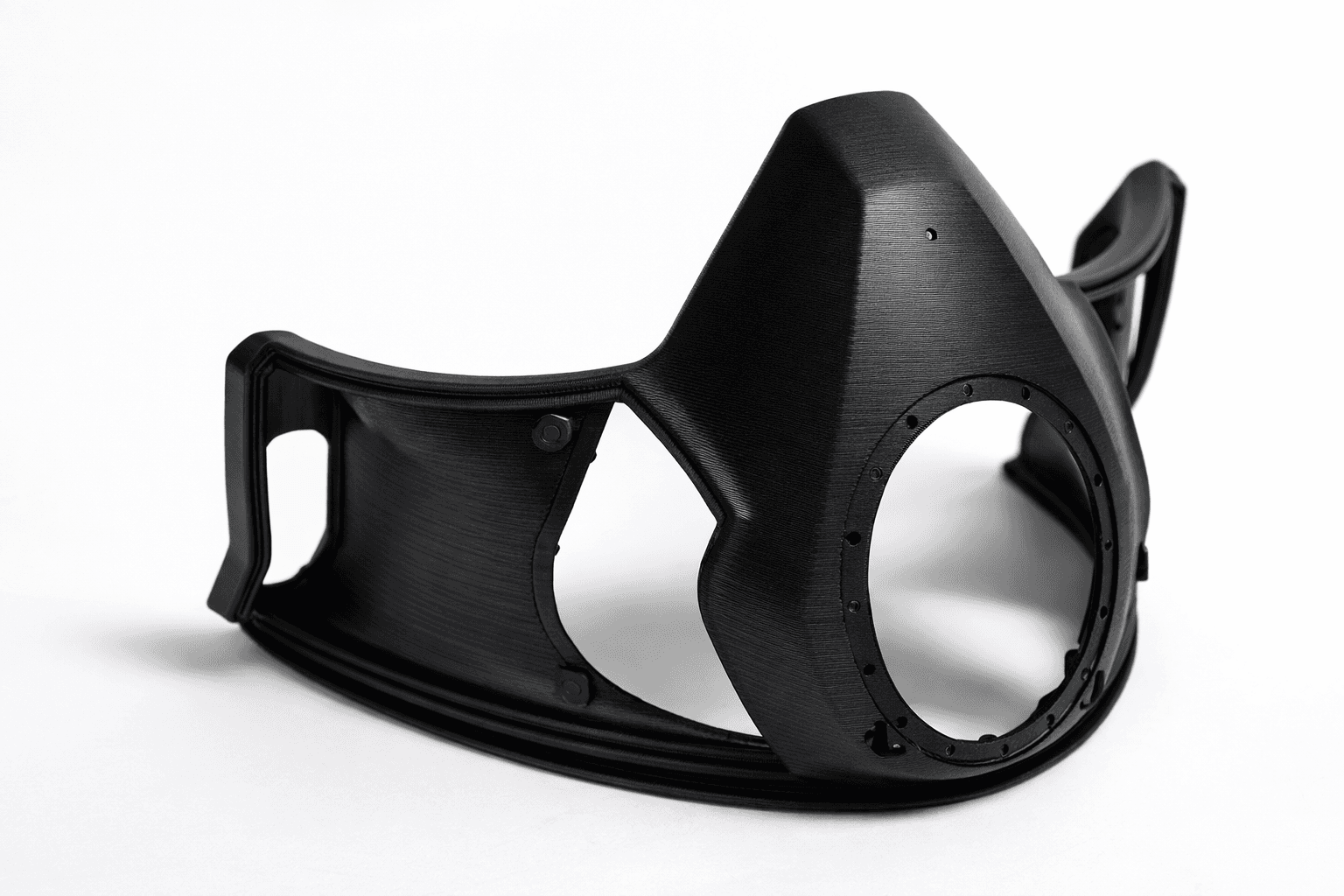 Black 3D printed automotive front fairing with integrated headlight bezel — an end-use automotive body part produced on the TAKT 3D print farm
