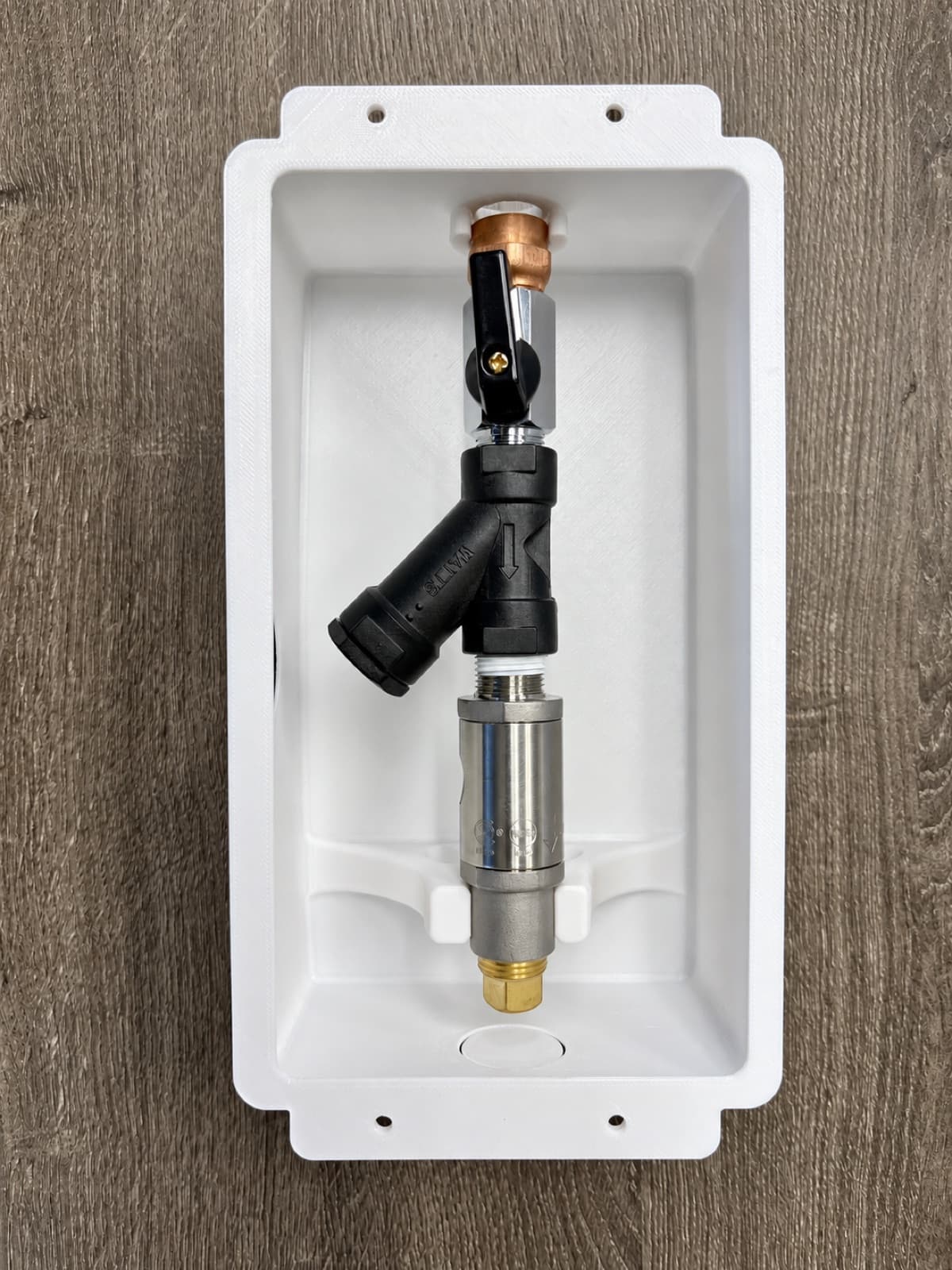 3D printed recessed housing with a ball valve and check-valve assembly fitted inside it