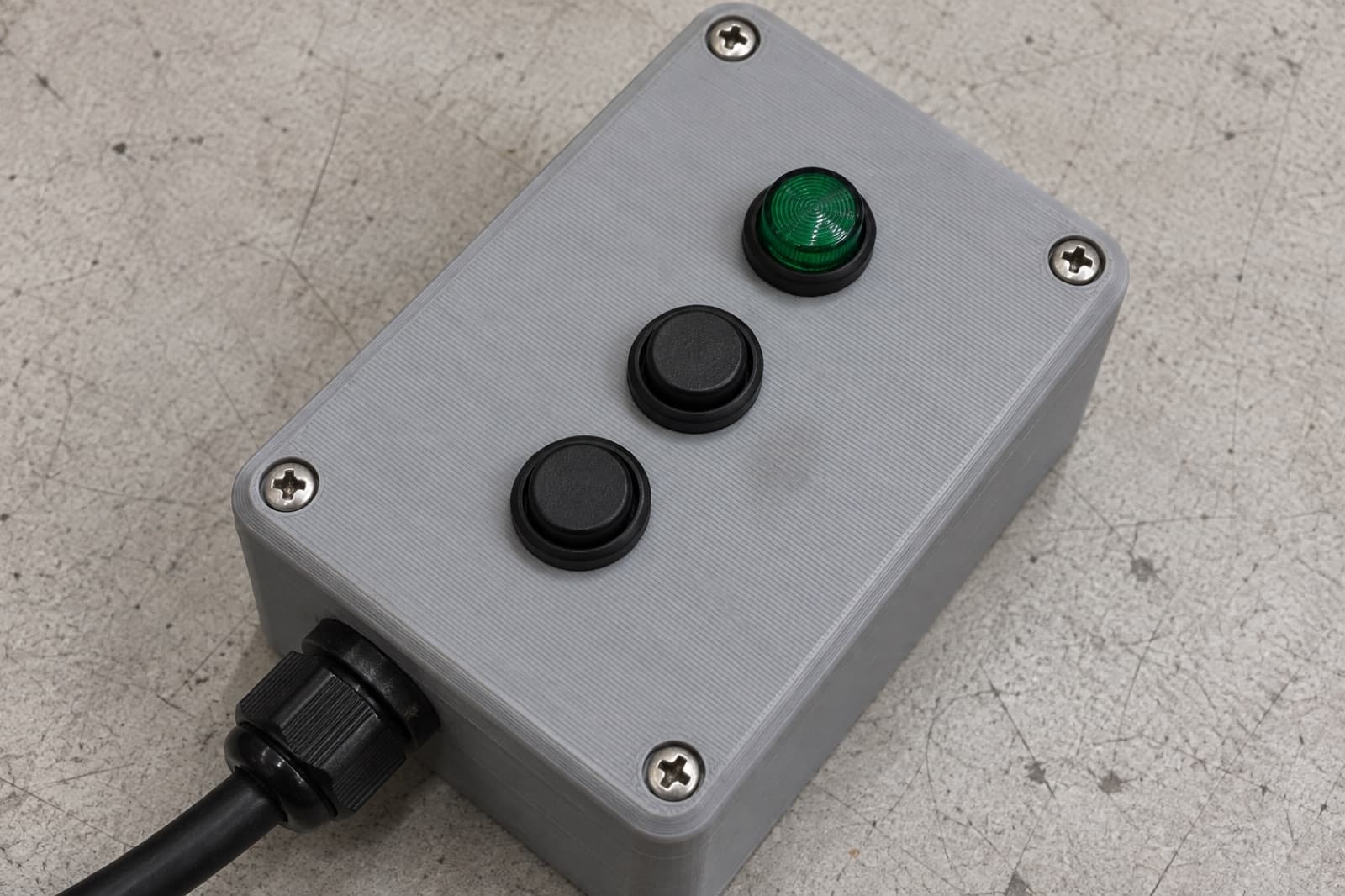 3D printed ABS control enclosure with pushbuttons, a pilot lamp and a cable gland